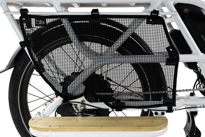 A Packa rear wheel guard shown on a white Packa bike
